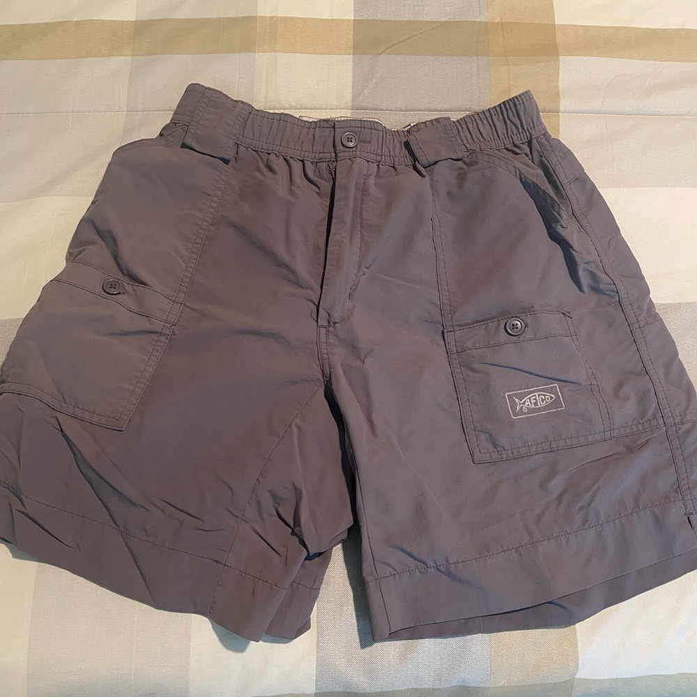 Lightly worn. Aftco shorts size 32. Lavender